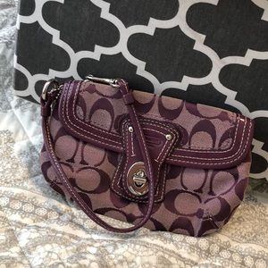 Purple coach wristlet
